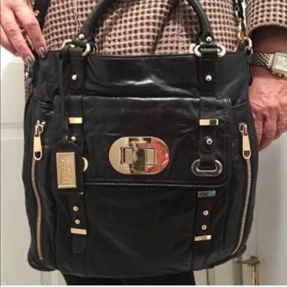 Beautiful Badgley Mischka black leather purse.